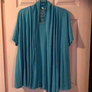 Blouse with cardigan attached appearance